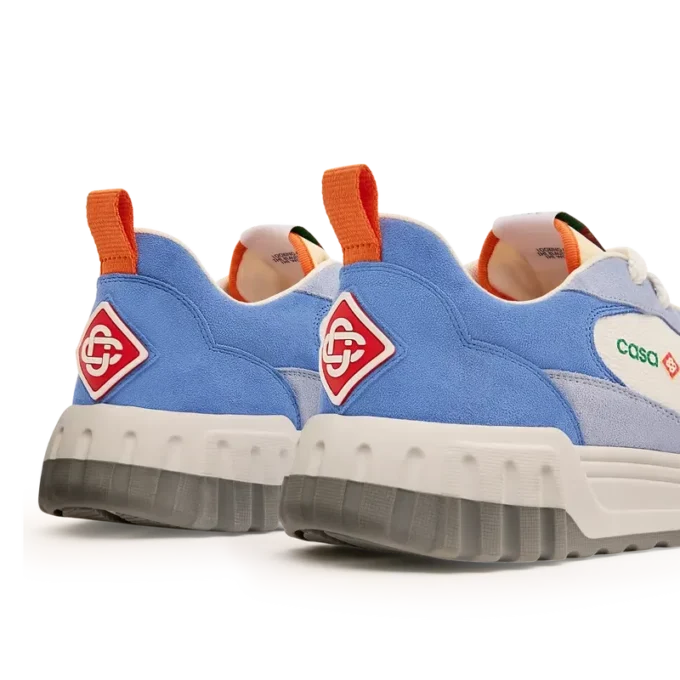 Baskets de tennis blanches et bleues pour homme