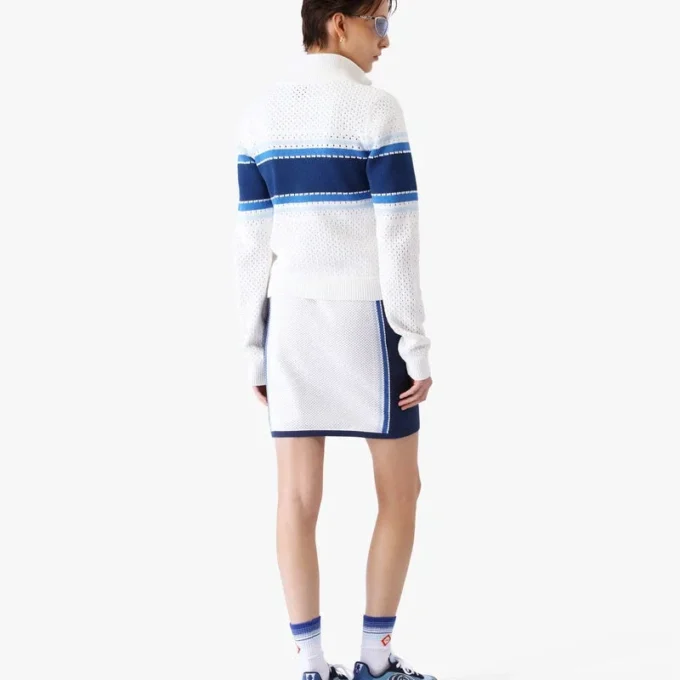 Blouson aviateur en maille rayée blanche et bleue