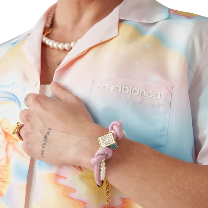 Bracelet à nœuds et perles rose