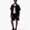 Chemise en maille à manches courtes noire en shorts Chemise en maille à manches courtes noire en shorts