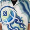 Chemise en soie à manches courtes « The Art of the Serve »
