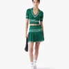 Mini-jupe plissée en maille verte Mini-jupe plissée en maille verte