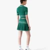 Mini-jupe plissée en maille verte Mini-jupe plissée en maille verte