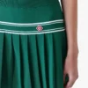 Mini-jupe plissée en maille verte Mini-jupe plissée en maille verte