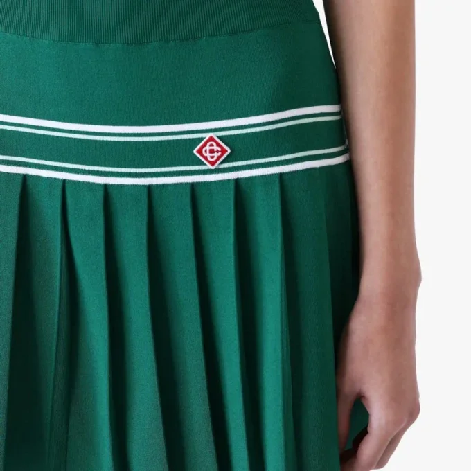 Mini-jupe plissée en maille verte Mini-jupe plissée en maille verte