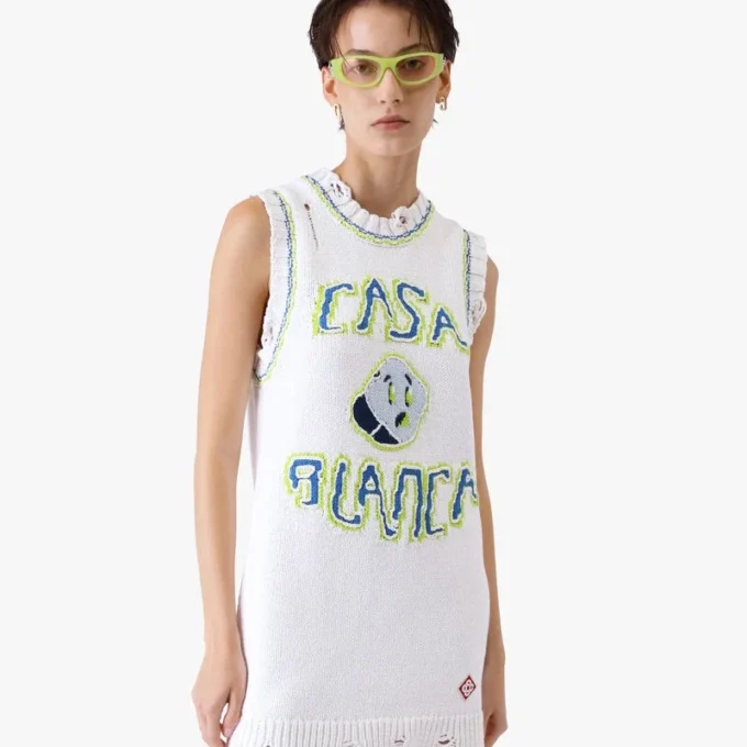 Mini-robe débardeur blanche tricotée à la main Mini-robe débardeur blanche tricotée à la main