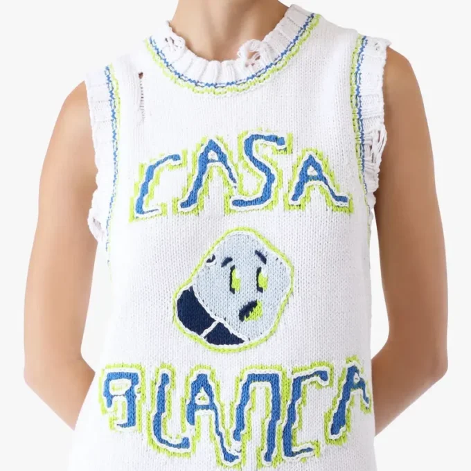 Mini-robe débardeur blanche tricotée à la main Mini-robe débardeur blanche tricotée à la main