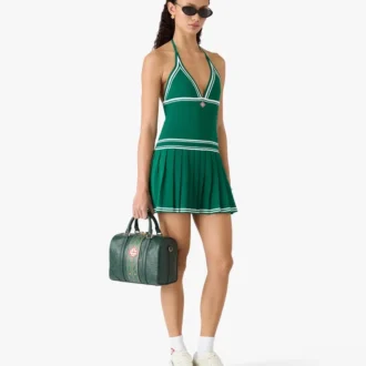 Mini-robe verte plissée à dos nu