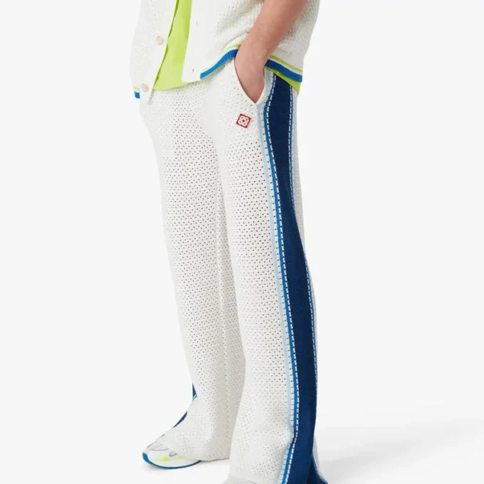 Pantalon de survêtement en maille rayée blanche et bleue Pantalon de survêtement en maille rayée blanche et bleue
