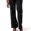 Pantalon sur mesure en laine à motif brodé