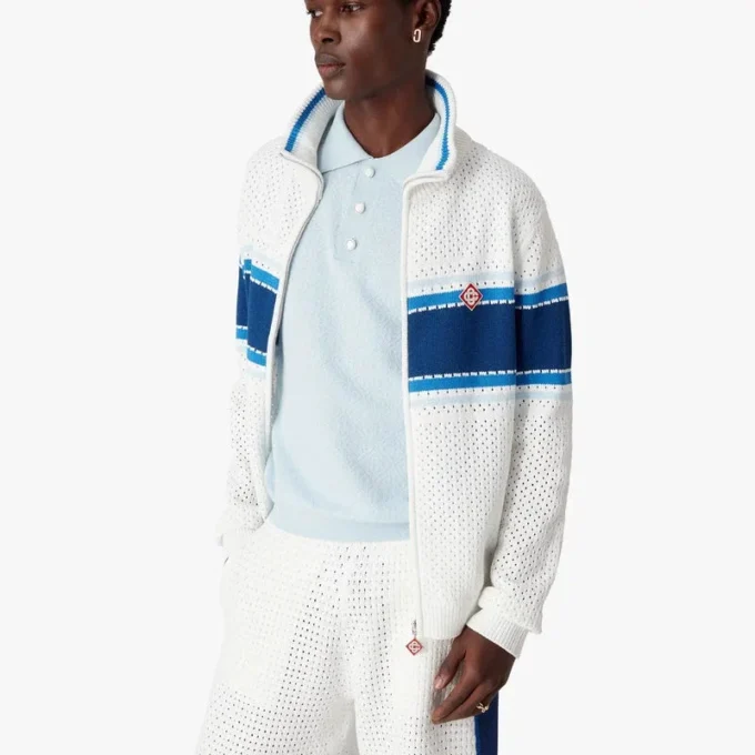 Veste de sport en maille rayée blanche et bleue